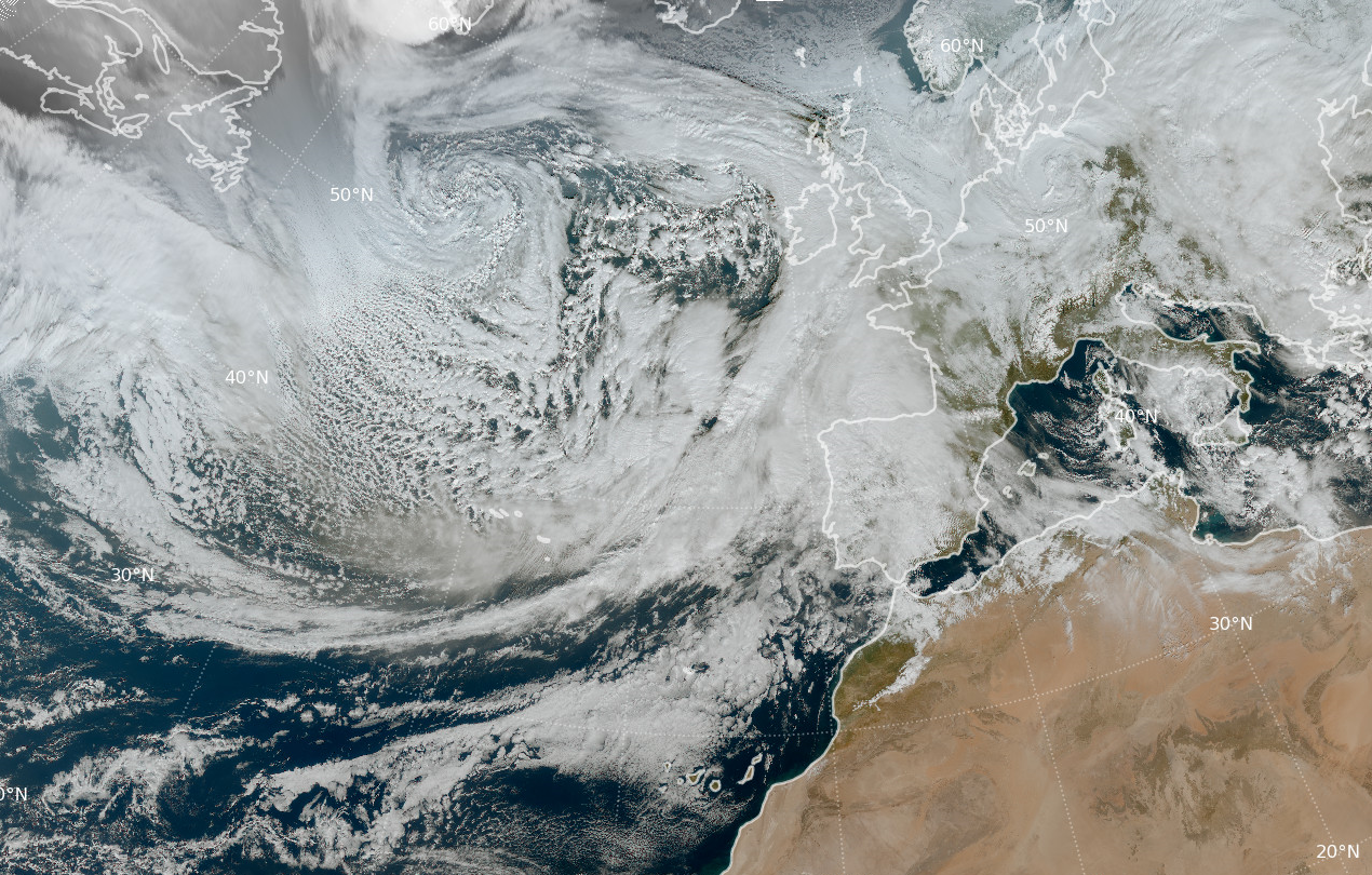 Borrasca Joseph a las 12 UTC del d&iacute;a 26 de enero de 2026 centrada al sur de Groenlandia, con la nubosidad asociada a su frente c&aacute;lido sobre el tercio noreste peninsular y su frente frio pr&oacute;ximo a entrar por el noroeste Galicia. Imagen RGB color verdadero del sat&eacute;lite Meteosat-12.